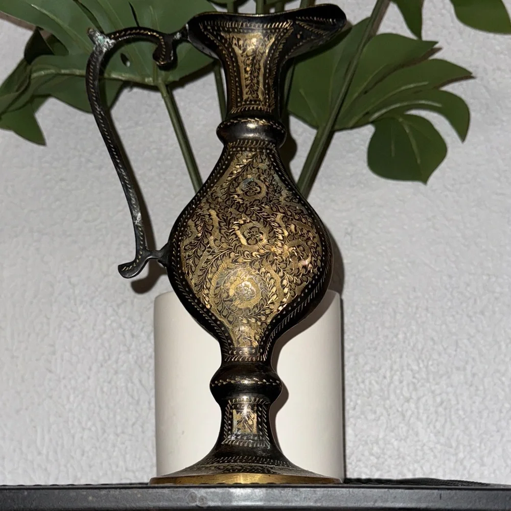 This is a‎ vintage decorative etched brass pitcher or ewer.